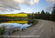 Reflection of Mount Deception in a small pond along Old Cherry Mountain Road in Carroll, New Hampshire USA during the spring months