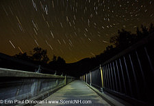 Star trails along the Kancamagus Scenic Byway (Route 112) in Lincoln, New Hampshire USA during the summer months
