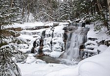 Franconia Notch State Park - Stair Falls in the White Mountains, New Hampshire USA. This waterfall is located along the Falling Waters Trail